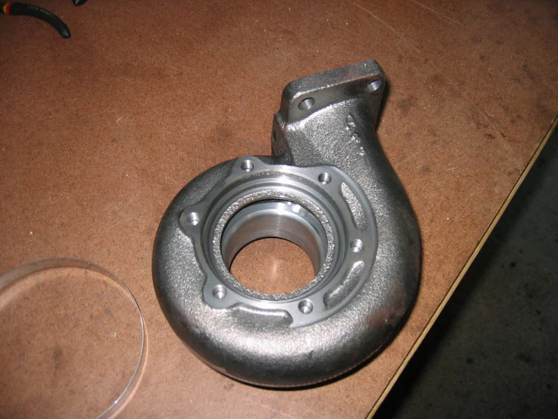 Empty Garrett GT30 turbine housing with the turbine wheel removed — real reference photograph, not the specific N54 TD03/TD04 part